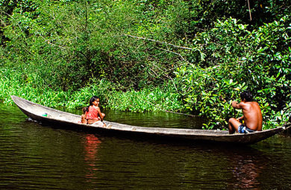 390px A Warao family in their canoe